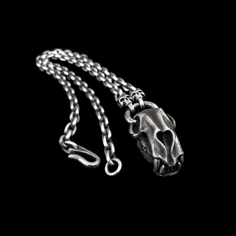 saber-toothed tiger pendant as a men's silver pendant necklace with saber-toothed tiger design