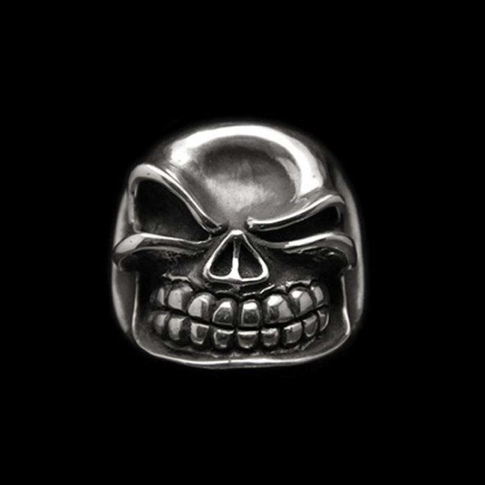 naughty grin skull ring as a men's statement ring with naughty grin skull design